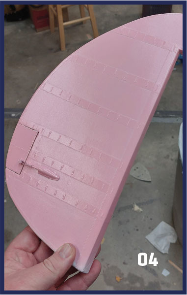 After covering the rudder with fabric using a small syringe filled with canopy glue, the author was able to simulate the rib stitching. The trim tab actuator is made from a pushrod and clevis. 