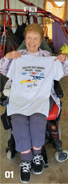 Hazel Sig proudly shows off an event shirt for the fly-in. Every registered pilot received one free of charge. The author had Hazel sign the shirt and donated it to the AMA National Model Aviation Museum. 