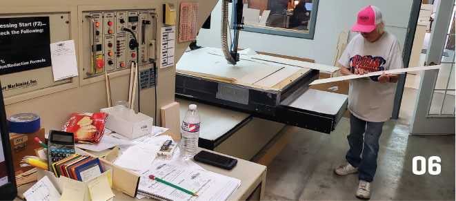 If you have purchased a lasercut kit made by Sig, this is probably the machine that cut it. A 30-year Sig employee inspects each piece of wood. 