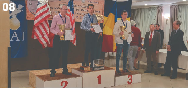 New World Champion Brett Sanborn (center; USA), with (L-R) John Kagan (USA), second place, and Dmytro Sednov (UKR), third place. 