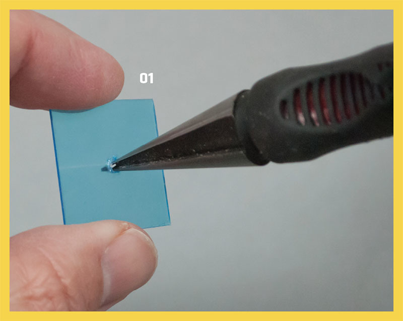 The author uses a Du-Bro Body Reamer to drill holes in plastic sheet when creating a captive screw. 