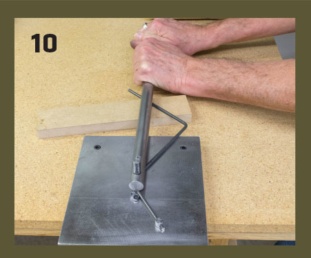 10. The bending operation should be slow and smooth to avoid overstressing the wire. Because the wire will spring back a little, you’ll need to go slightly past your angle reference mark. For the second bend shown here, a scrap piece of 3/4-inch MDF suppo