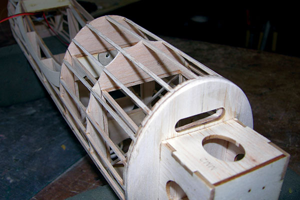the fuselage formers are scalloped between the stringers