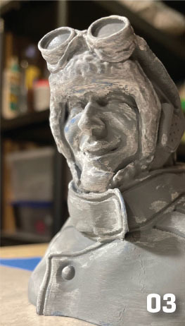After sanding with 600-grit sandpaper and sticks, the author coated the face with Perfect Plastic Putty and lightly sanded it smooth. 