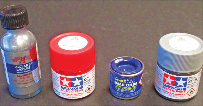 Shown are a few of the lacquer, acrylic, and enamel paints used to paint vacuum-formed parts. Other brands work equally well, as long as they’re compatible with the type of plastic with which they’re used. 