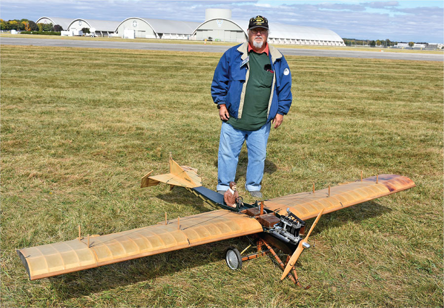 Peter Hanley is shown with his Martin-Handasyde No. 3 that is powered by an O.S. IL-300 four-cylinder, inline glow engine. 
