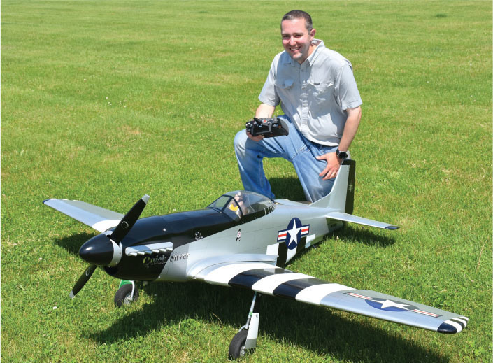 Anthony Bliss is shown with his first Giant Scale model, a Top Flite P-51 ARF. 