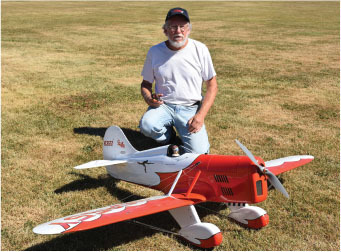 Mike Dudley and his Henry Haffke plans-built 1/4-scale, electric-powered Gee Bee Model D Sportster. 