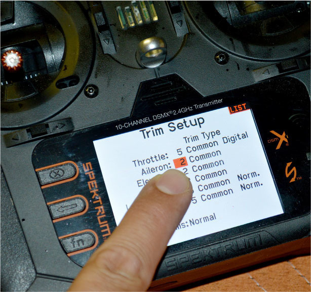 It is important to understand the full potential that a radio system has to offer. One neat feature that some pilots overlook is the trim setup, shown here on a Spektrum NX10, where the trim steps amount can be decreased to fine-tune the aircraft. 
