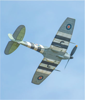 The author’s 27-inch Seafire Mk LIII soars above Wawayanda using a 10-inch Easy Built Models white propeller on the nose. Photo by Peter Kaiteris. 