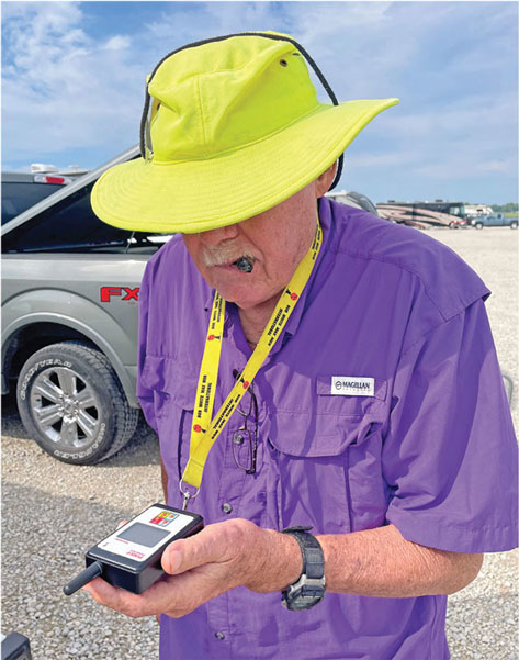 Faust Parker uses the Pyxis GPS system to track his F1C Power models. A lanyard keeps the receiver handy. GPS tracker systems are becoming a popular alternative to using tracking radios. 