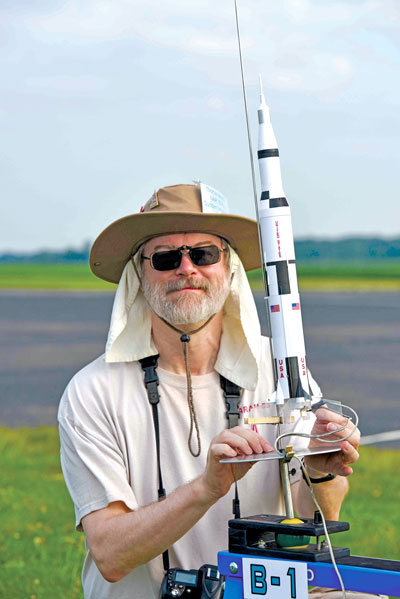 Tom Beach, editor of Sport Rocketry magazine, with his Saturn V, a salute to the Apollo 11 mission.