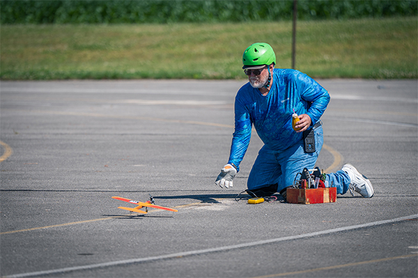 A team member readies for a pit stop during CL Racing.