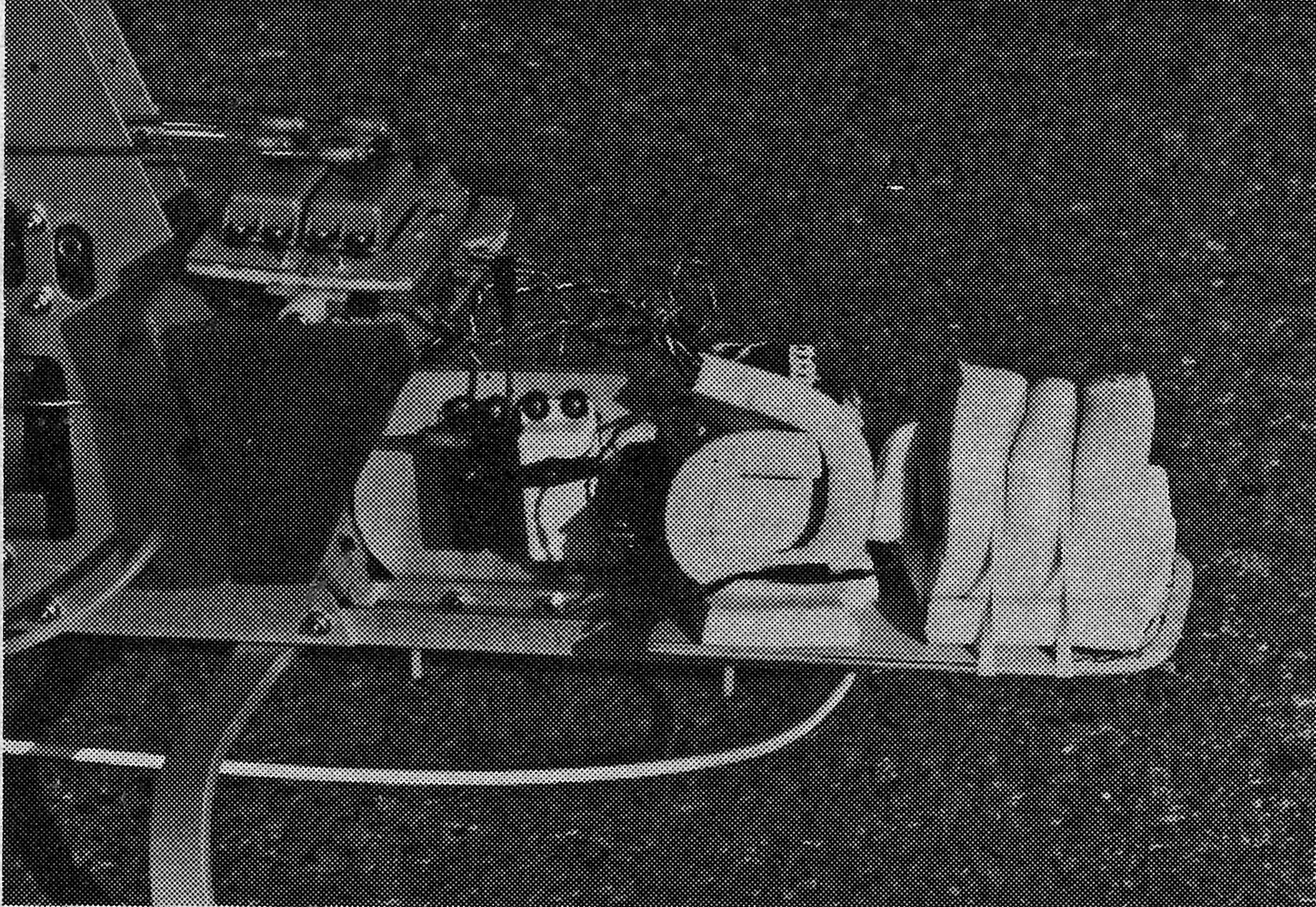 Photo at right, above, reveals spacious provision for the RC installation. The three servos on the upper tray control main rotor cyclic and tail rotor pitch. The white servo lower down moves the tray to provide collective pitch and tail rotor mix. The fif