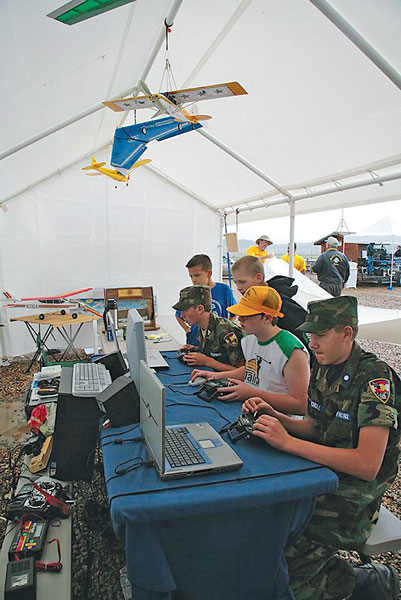 Having plenty of simulators provides a great ground school. It also keeps restless kids happy, particularly if the weather turns temporarily sour.