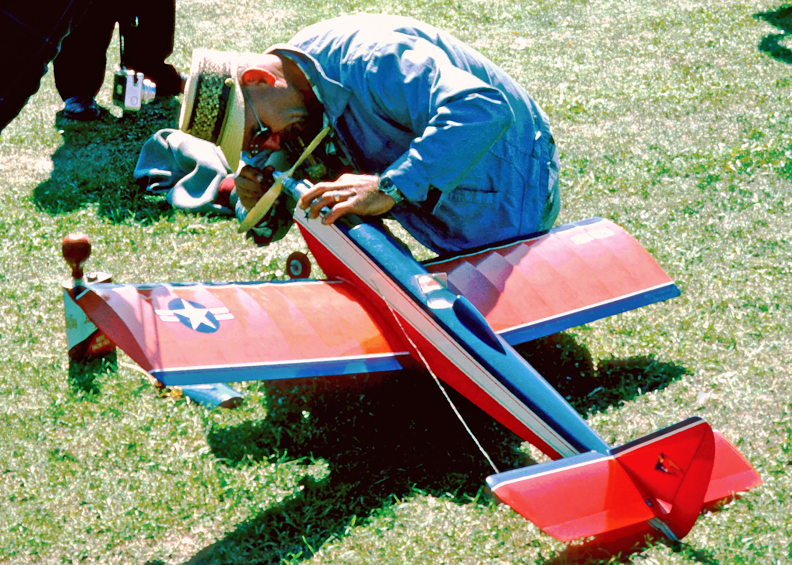 Hal “Pappy” deBolt tinkers with his original-design P-Shooter at a contest in the 1960s.