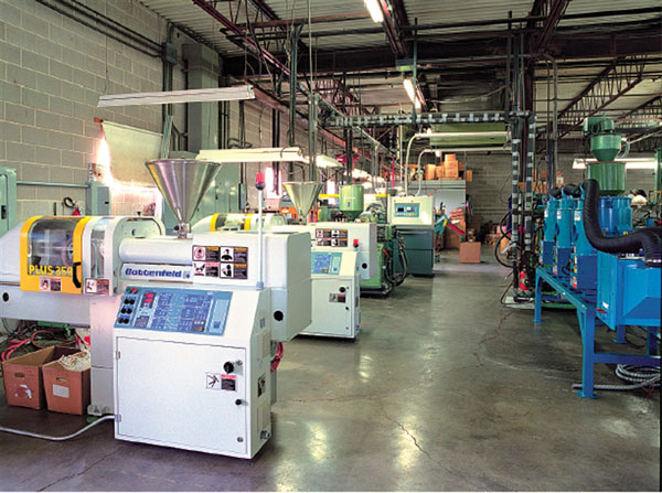 Molding machines at the Du-Bro Products factory in Wauconda, Illinois