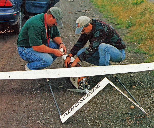 Ross Hoag and Kip Jackson power-up avionics box and tape nose cone. 