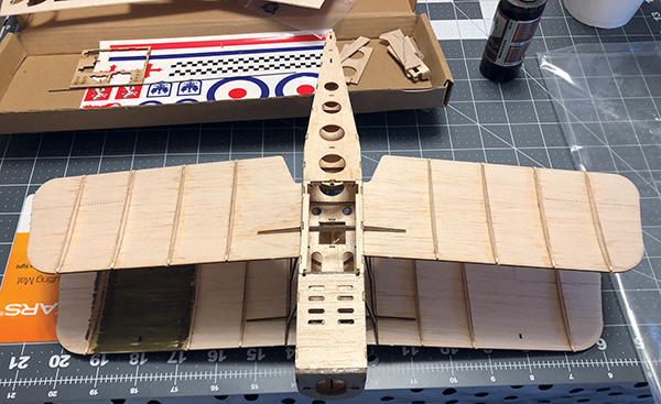 The wings have been assembled and added to the fuselage. Note the ribs on the wings to give the needed airfoil shape.