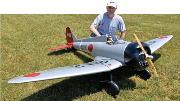Tony is shown with his newly completed DLE-120-powered A5M4 Claude. 
