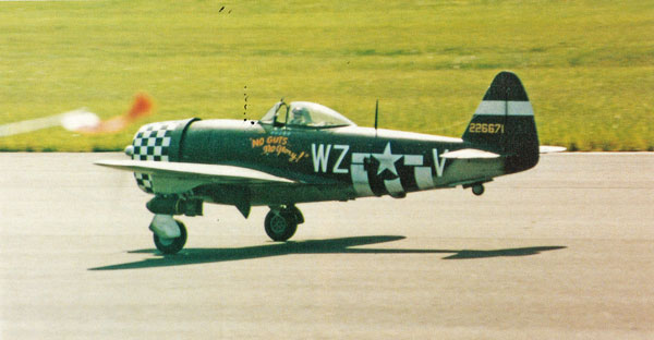 Greg Hahn’s P-47 with main gear just touching down. Hold the tail up until airspeed has bled off then let the tail settle. 