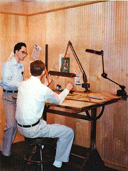 Victor and Joe in their original office, designing one of their creations. Victor had the ideas and Joe executed them. 