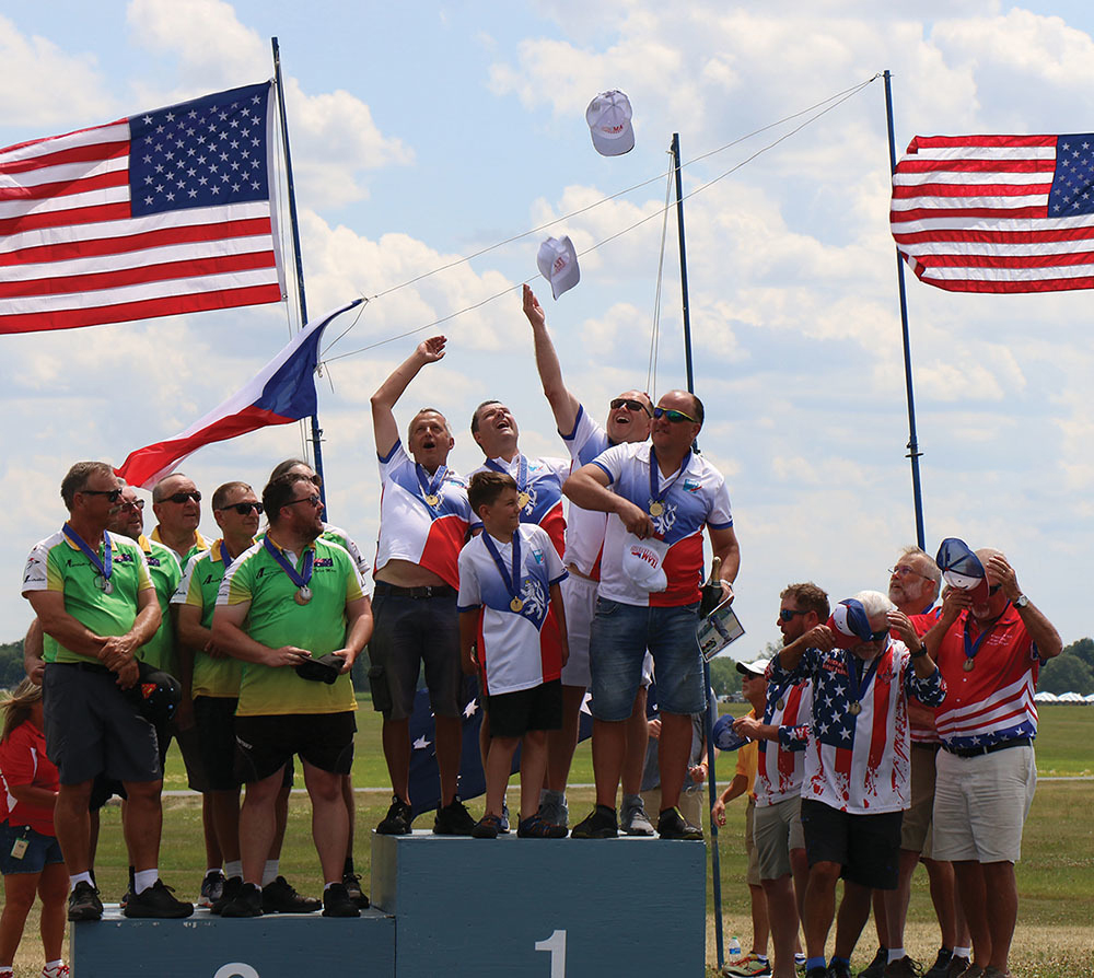 Czech Republic team members throw their hats in the air to celebrate winning the F3E Team contest. Team Australia finished second and Team USA placed third.
