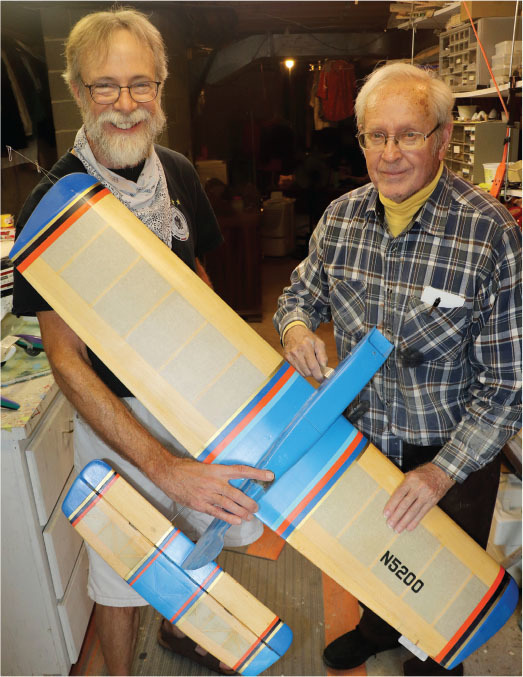  Walt Brownell and Lafayette Esquadrille President John Garrett with one of the CL Aerobatics models that was donated to the club. 