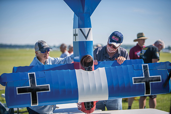 dale arvin presents his fokker d vii for static judging in the rc scale contest
