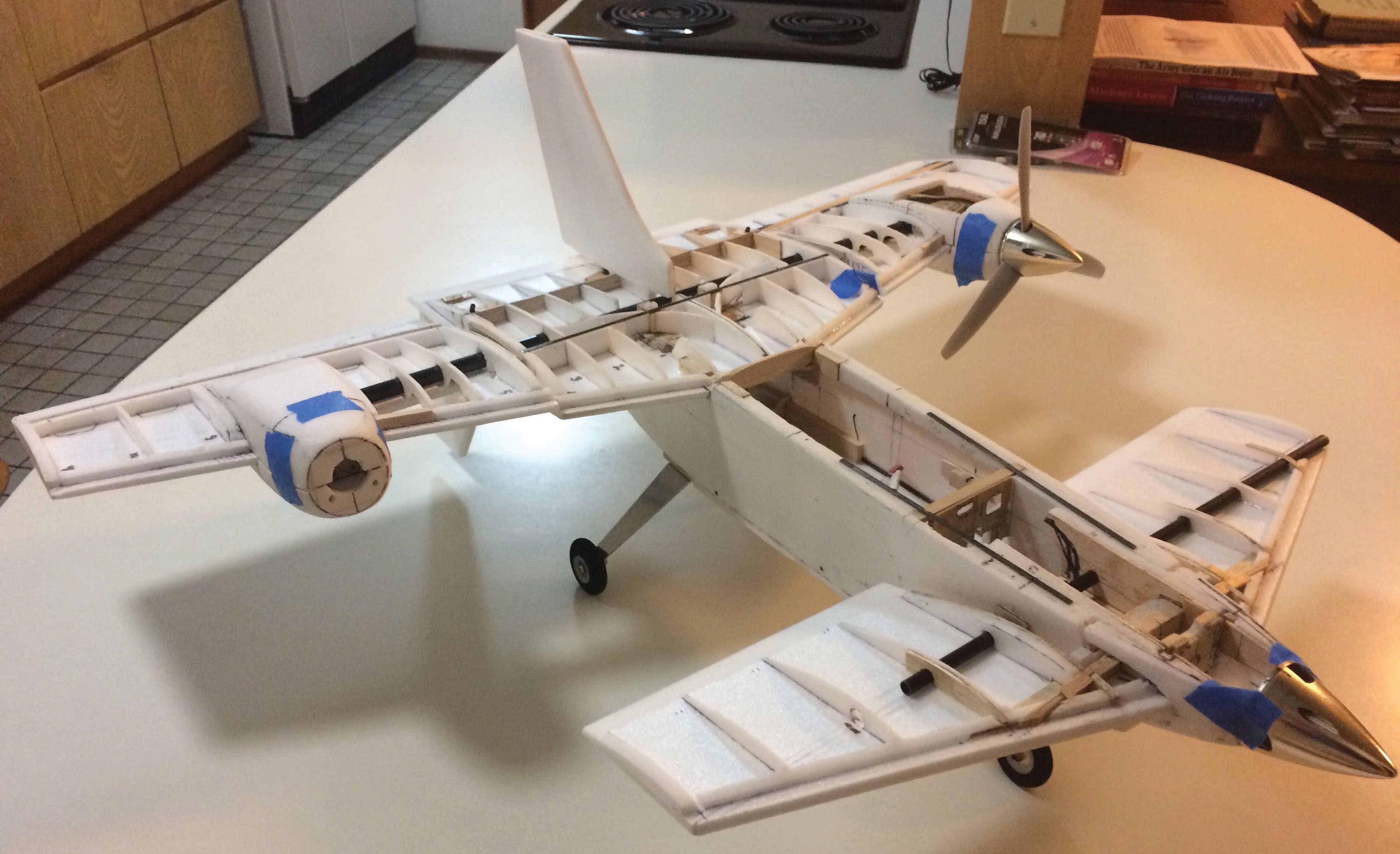 the wings and landing gear are attached