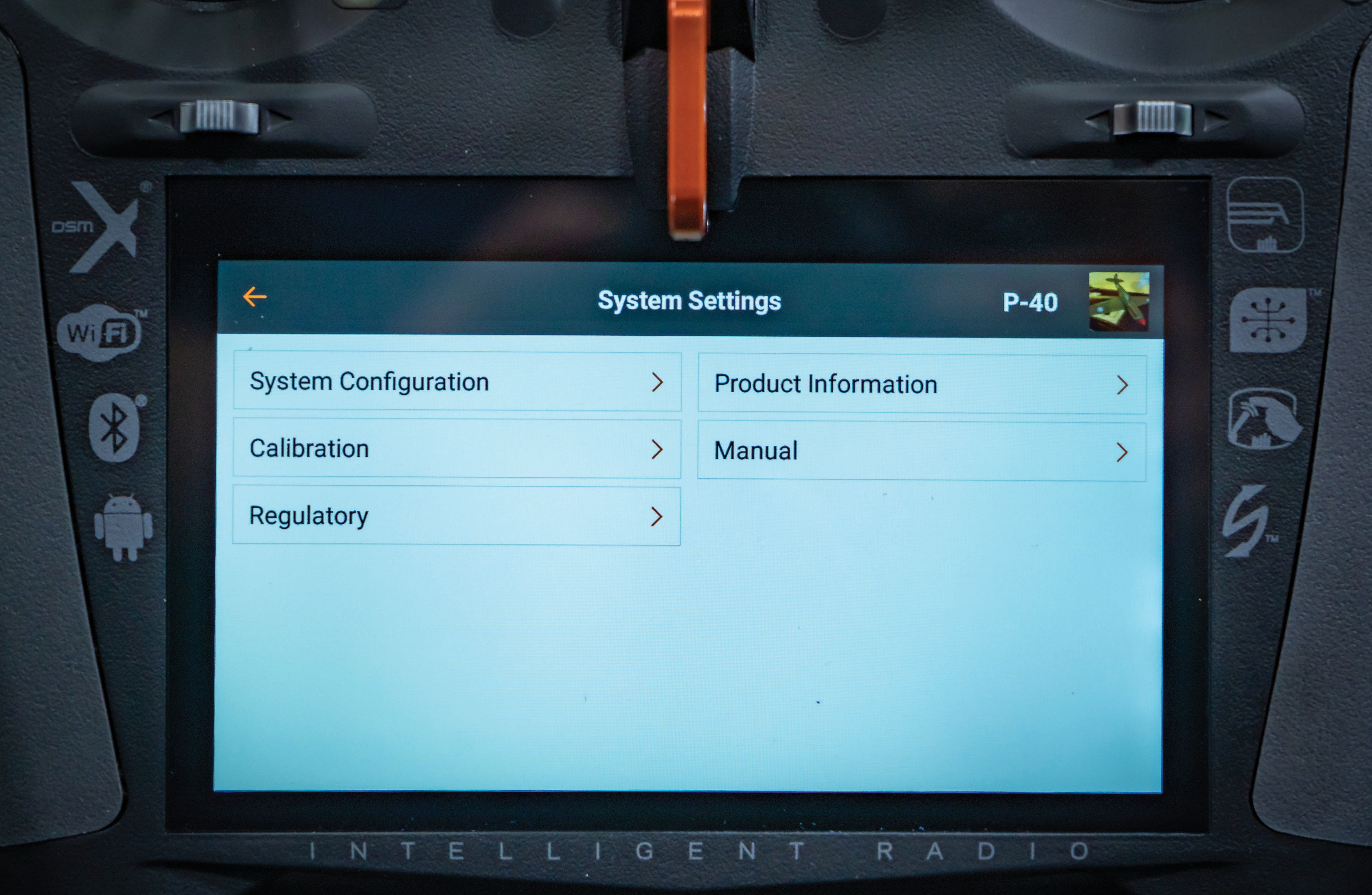 the system settings menu is accessed from any of the main screens by touching the system